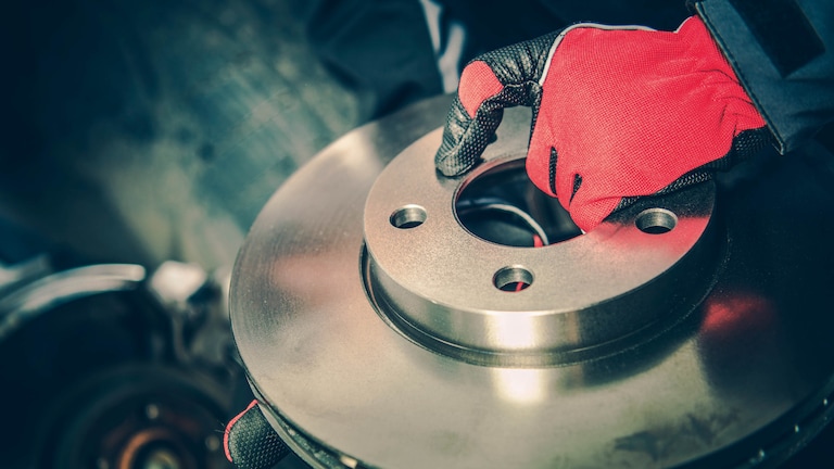 Vauxhall mechanic talking to customer